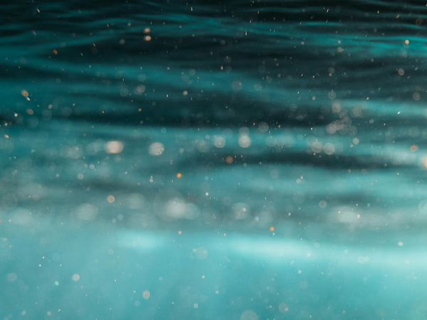 Abstract image of gentle waves representing the flow of breath.
